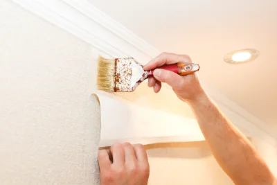 Pose de papier peint à Guitté — revêtements muraux et toiles de verre